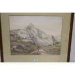 A FRAMED AND GLAZED WATERCOLOUR OF A MOUNTAINOUS SCENE SIGNED HARRY GIBBERD