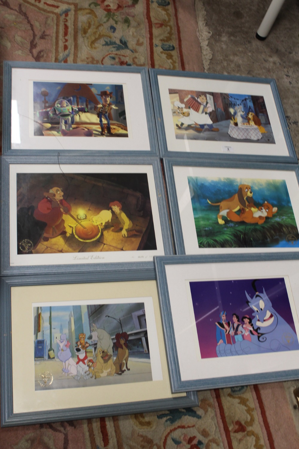 A COLLECTION OF ELEVEN FRAMED AND GLAZED 'THE DISNEY STORE' EXCLUSIVE COMMEMORATIVE LITHOGRAPHS 1998