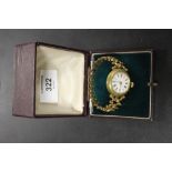 AN ANTIQUE WRIST WATCH