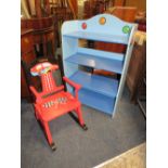 A CHILDS BLUE BOOKCASE AND ROCKING CHAIR (2)