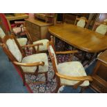 A MODERN EXTENDING DINING TABLE AND SIX CHAIRS