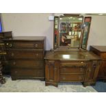 AN OAK CHEST AND DRESSING TABLE