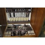 AN OAK CASED CANTEEN OF CUTLERY