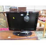 A SMALL SAMSUNG 22" FLATSCREEN TV WITH PANASONIC HEADPHONES