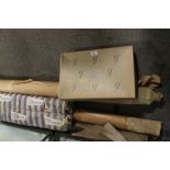 A QUANTITY OF VINTAGE CURTAIN FABRIC ROLLS ETC