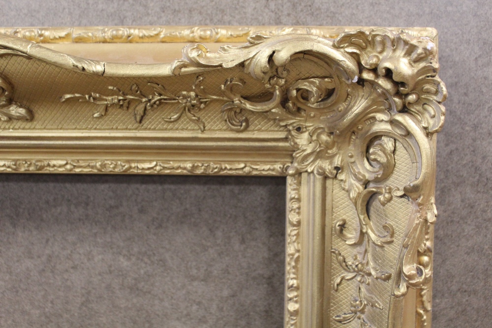 A 19TH CENTURY GILTWOOD PICTURE FRAME WITH CARVED DETAIL, REBATE 53.5 X 44 CM - Image 2 of 2