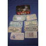 A TIN OF BRITISH WORLD COINS AND BANK NOTES