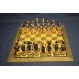 A BOXED STUDIO ANNE CARLTON CHESS SET |BATTLE OF TRAFALGAR|