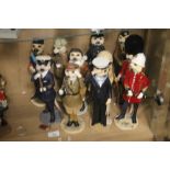 ELEVEN COUNTRY ARTISTS MEERKAT FIGURES TO INCLUDE SHERLOCK HOLMES, POLICE AND MILITARY TYPES