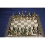 AN UNBOXED PAINTED STUDIO ANNE CARLTON SHERLOCK HOLMES CHESS SET