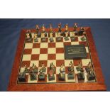 A BOXED STUDIO ANNE CARLTON CHESS SET |BATTLE OF WATERLOO|