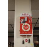 A RETRO STYLE COCACOLA WALL CLOCK