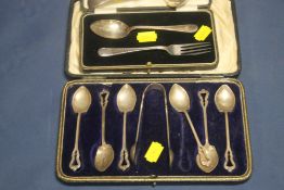 A CASED SET OF 6 SILVER SPOONS AND A BOXED SPOON AND FORK SET