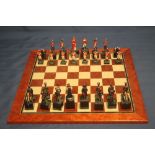 A BOXED STUDIO ANNE CARLTON CHESS SET, |BATTLE OF WATERLOO|