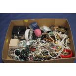 A BOX OF ASSORTED COSTUME JEWELRY