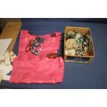 A BOX OF ASSORTED COSTUME JEWELRY