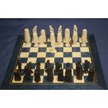 AN UNBOXED EGYPTIAN CHESS SET A/F