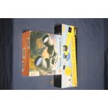 A BOXED SET OF BRESSER 10/50 BINOCULARS AND A BOXED LAND AND SKY TELESCOPE