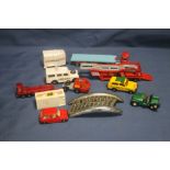 A QUANTITY OF ASSORTED TOY VEHICLES TOGETHER WITH A TRIUMPH CAR BADGE