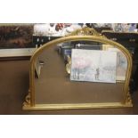 AN OVERMANTLE MIRROR 126 CM X 91 CM