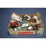 A BOX OF ASSORTED COSTUME JEWELRY