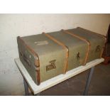 A FOUR BANDED STEAMER TRAVEL TRUNK