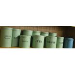 A SET OF 1940'S GREEN PAINTED TIN KITCHEN STORAGE JARS