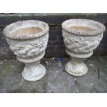 A PAIR OF LARGE CONCRETE GARDEN URNS