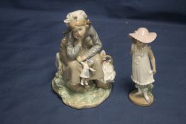 A LLADRO TOGETHER WITH A NAO FIGURINE