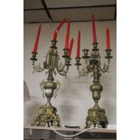 A PAIR OF CONTINENTAL STYLE BRASS CANDLEABRAS