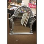 A HANGING WALL MIRROR WITH PLASTIC FRAME