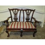 A REPRODUCTION MAHOGANY CHILDS CHIPPENDALE STYLE BENCH / SETTEE