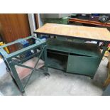 A STEEL WORKSHOP BENCH TOGETHER WITH AN INDUSTRIAL STEEL FRAMED TRESTLE TABLE