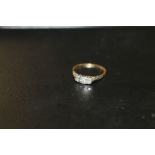 AN 18CT GOLD AND PLATINUM THREE STONE ILLUSION SET DIAMOND RING , APPROX 2 G, RING SIZE N