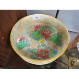 AN EARLY HAND PAINTED ROYAL DOULTON CERAMIC FLORAL BOWL