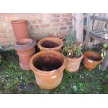 A QUANTITY OF 9 ASSORTED TERRACOTTA GARDEN PLANTERS TO INCLUDE 2 CHIMNEY POTS