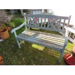 A PAINTED GREEN HARDWOOD GARDEN BENCH