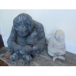 A CONCRETE SEATED GORILLA GARDEN ORNAMENT AND A SMALLER EXAMPLE (2)