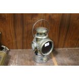 A VINTAGE BRASS LUCAS KING ROAD LAMP