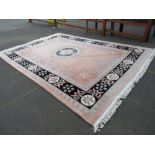 A VERY LARGE MODERN CHINESE WOOLLEN RUG 306 X 435 CM