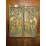A PAIR OF CARVED WOODEN & GILDED PLAQUES DEPICTING FIGURES AND BUILDINGS