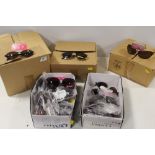 FIVE BOXES OF PACKAGED SUN GLASSES