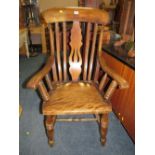 A TRADITIONAL ELM KITCHEN ARMCHAIR