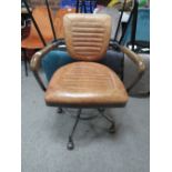 A RETRO STYLE BROWN LEATHER SWIVEL OFFICE ARMCHAIR