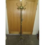 A BRASS EFFECT HAT/COAT STAND