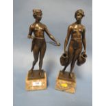 A PAIR OF CLASSICAL ROMAN STATUES DEPICTING THE WATER CARRIER AND THE ARCHER RAISED ON ONYX BASES