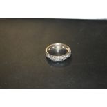 AN UNMARKED ETERNITY RING, APPROX 3.5 G, RING SIZE Q