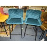 A PAIR OF MODERN GREEN UPHOLSTERED KITCHEN STOOLS