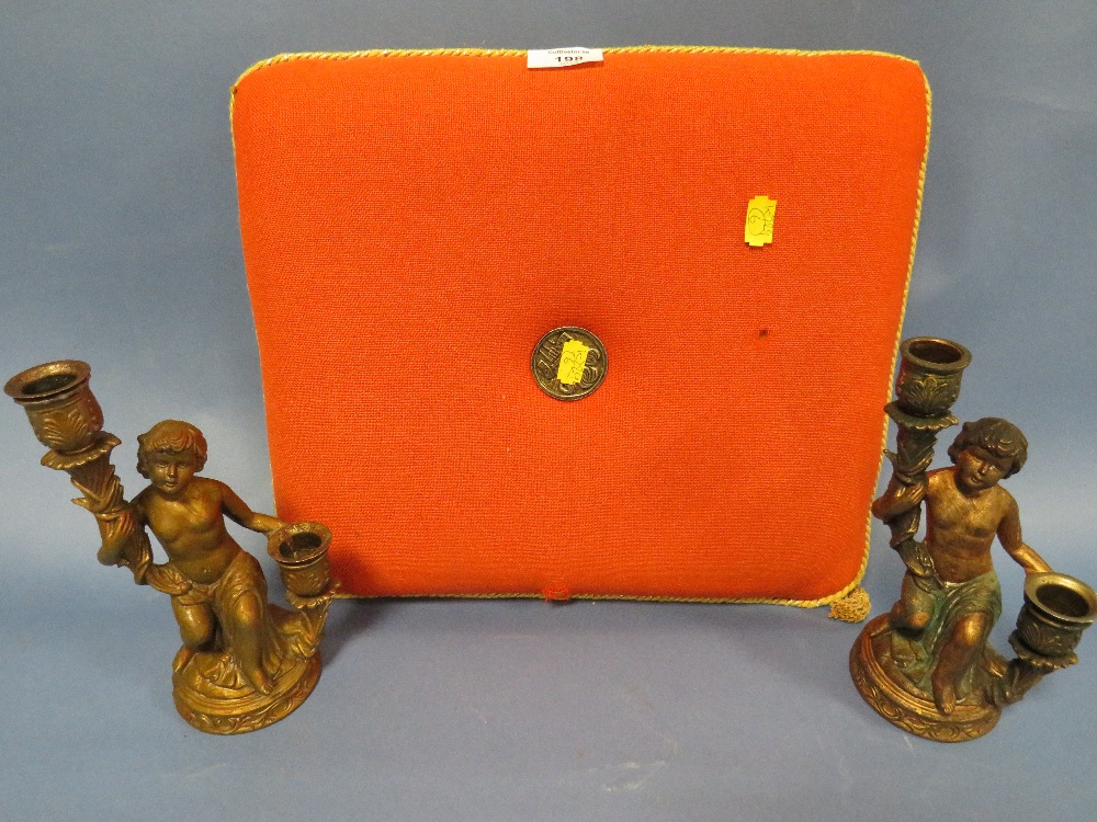 A PRINCE OF WALES INVESTITURE SEAT PAD FROM CAERNARFON CASTLE TOGETHER WITH TWO PLASTIC CHERUBIC