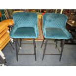 A PAIR OF MODERN GREEN UPHOLSTERED KITCHEN STOOLS